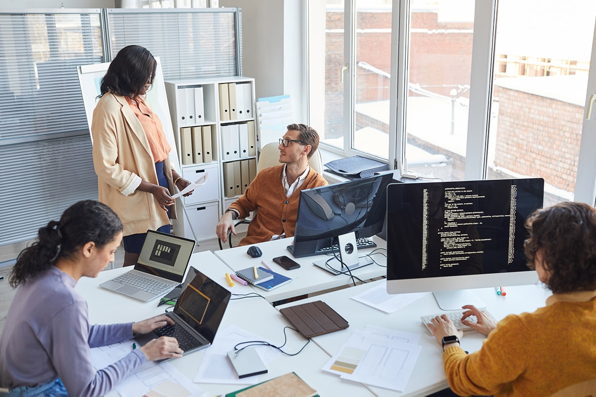 A Team Of Software Engineers Discussing A Project