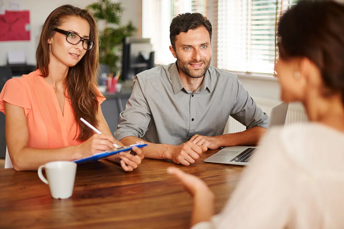 Two employers interviewing an applicant